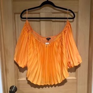Orange off the shoulder pleated shirt